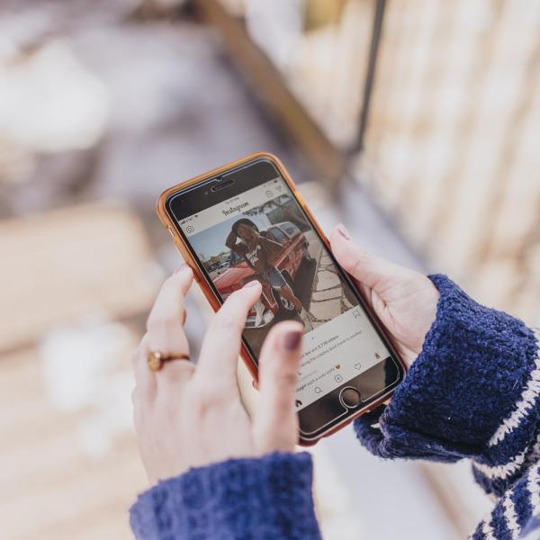 person posting on Instagram