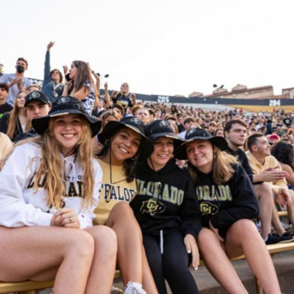 students at football game