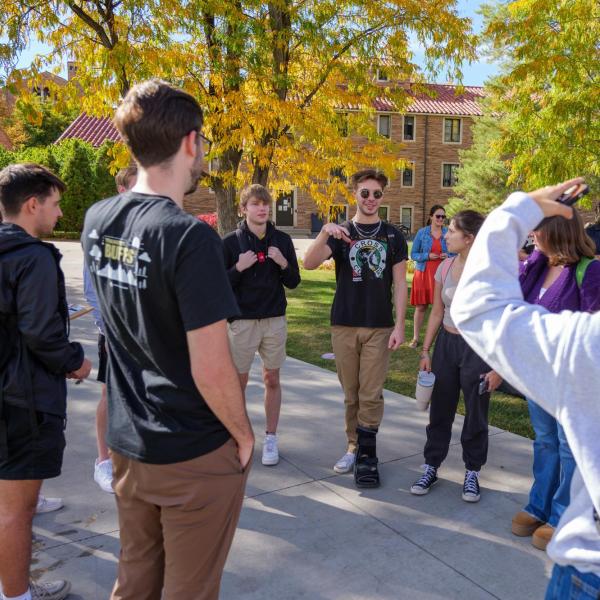 Leeds students talk in a circle during National Transfer Student Week