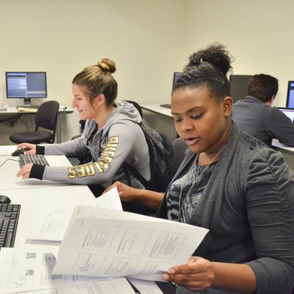 Students do work on computers