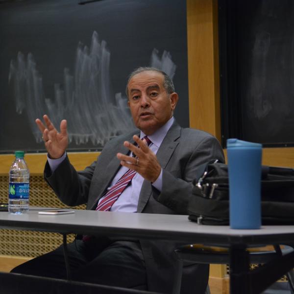 Libyan Prime Minister Mahmoud Jibril addresses a room full of students