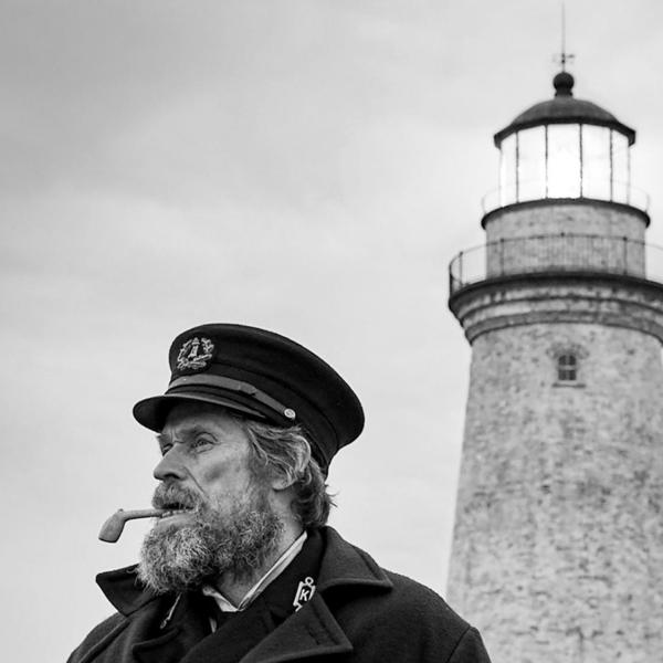 Black and white photo of Willem Dafoe and Robert Pattinson in The Lighthouse film