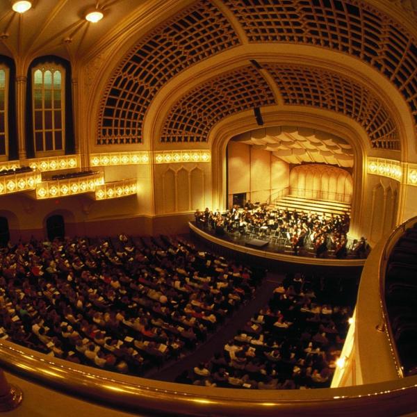 Band on stage at Macky Auditorium