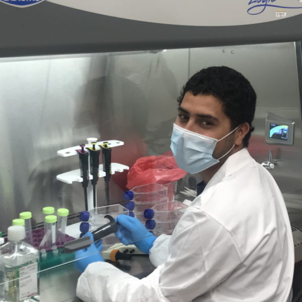 Graduate student Marina Nieto Caballero and visiting virology scholar Eddie Fuques Villalba, preparing to assess the infection potential of murine Coronavirus in CU Boulder SEEL-based environmental engineering laboratory.