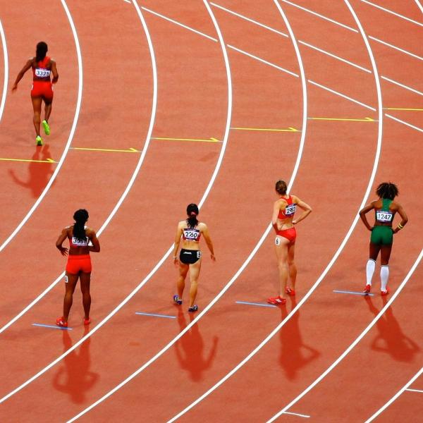 Female sprinters lined up for race