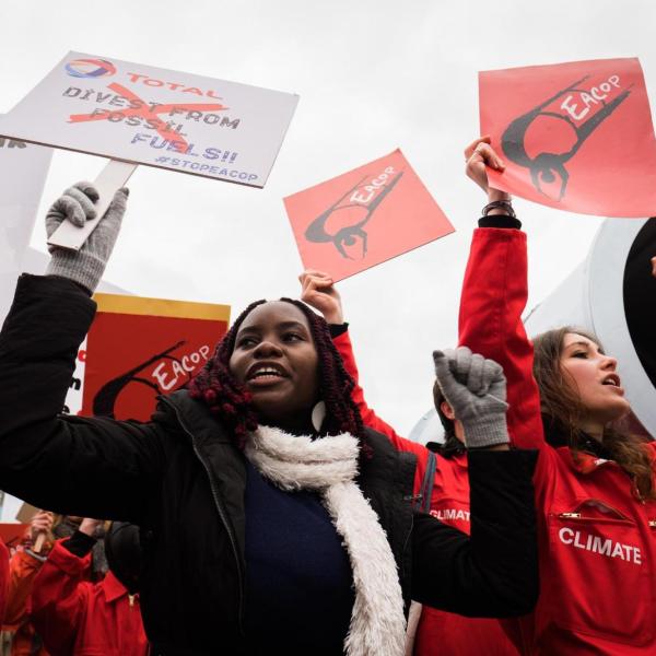 Hilda Flavia Nakabuye, center, joins a protest.