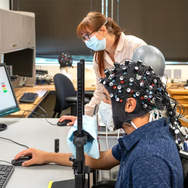 Researchers in a lab on campus