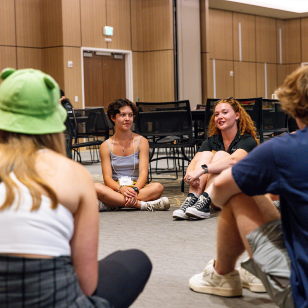 Transfer sudents sit in a circle