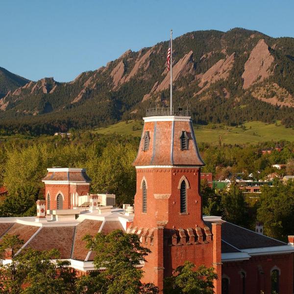 Old Main in front of the Flatirons