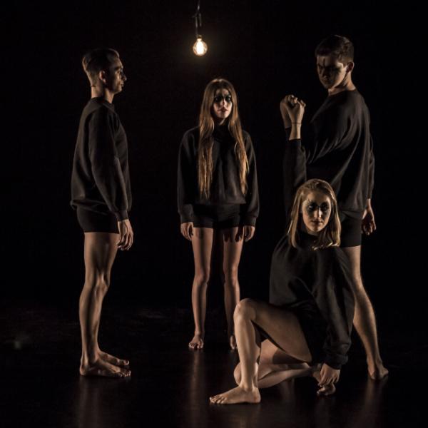 Students dressed in black for Open Space dance performance