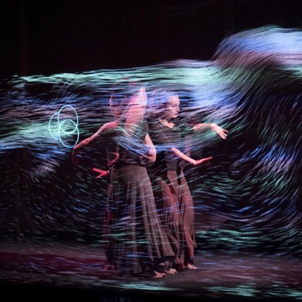Visual art performance by Kenji Williams as part of the Conference on World Affairs.