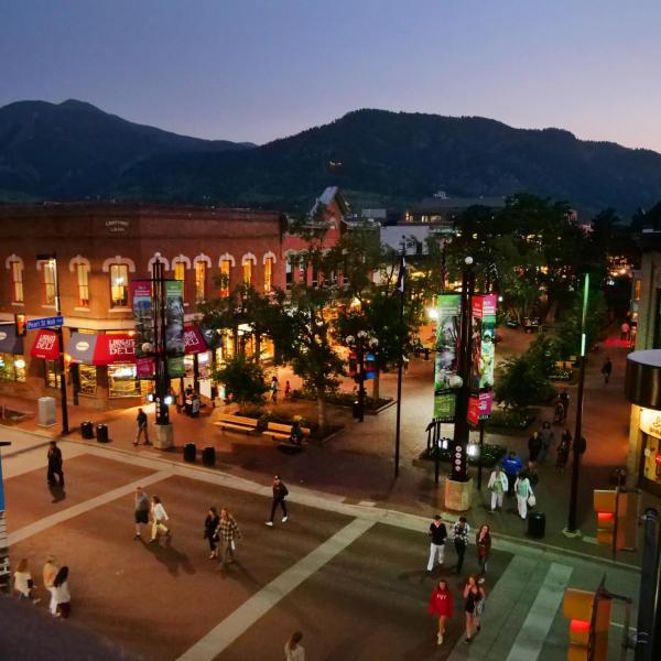 Pearl Street in Boulder at nighttime.