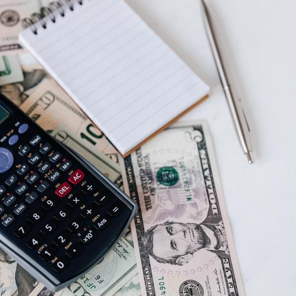 Calculator and money.