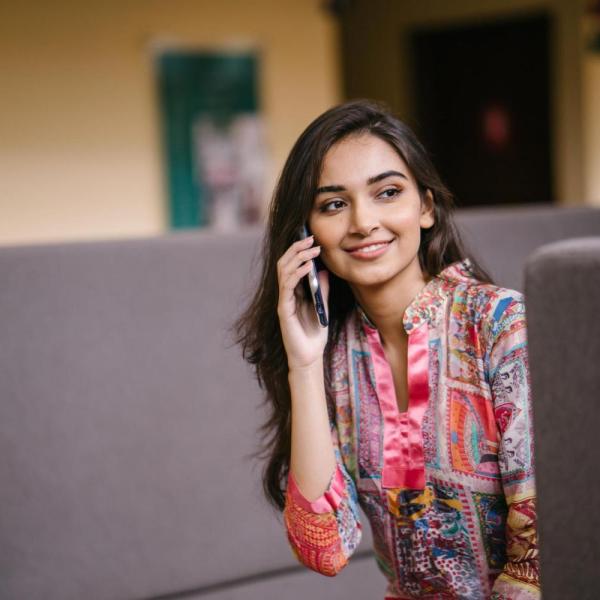 Person on phone smiling