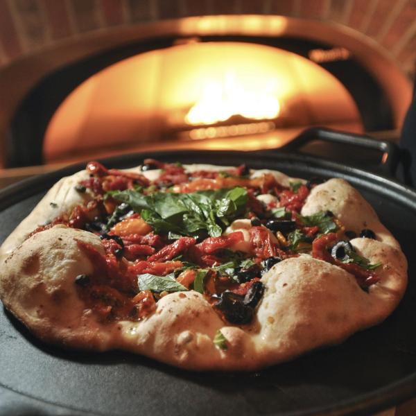 pizza coming out of the oven in the C4C