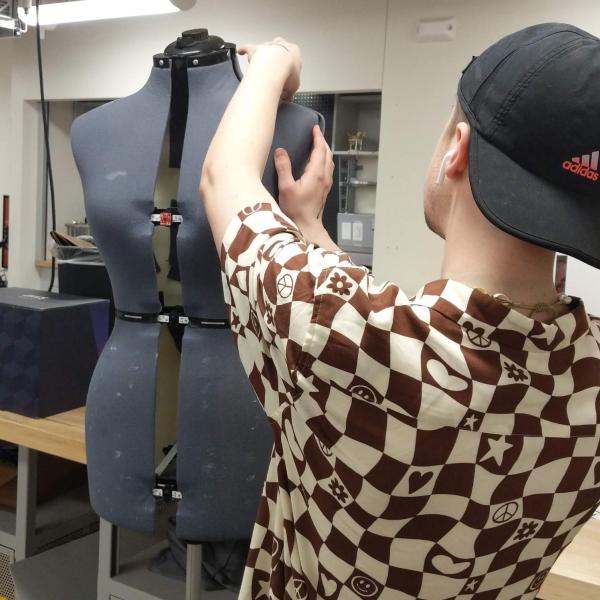 Undergrad works with a mannequin for the project