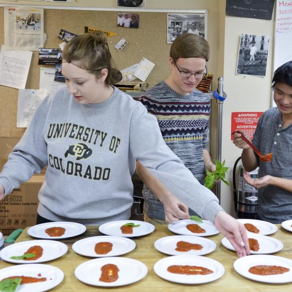 Students cooking.