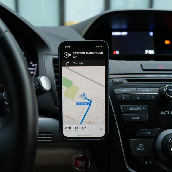 GPS directions displayed on a smartphone mounted in a vehicle