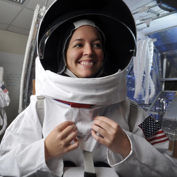 Students wearing space suits