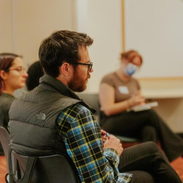 Student Conduct & Conflict Resolution staff members lead a group discussion