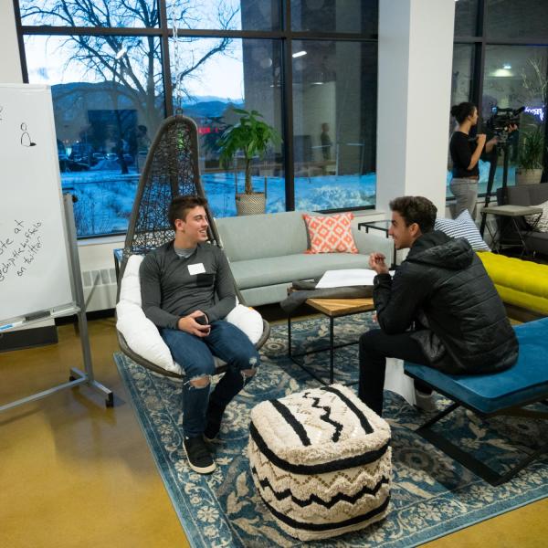 students chatting at a campus event