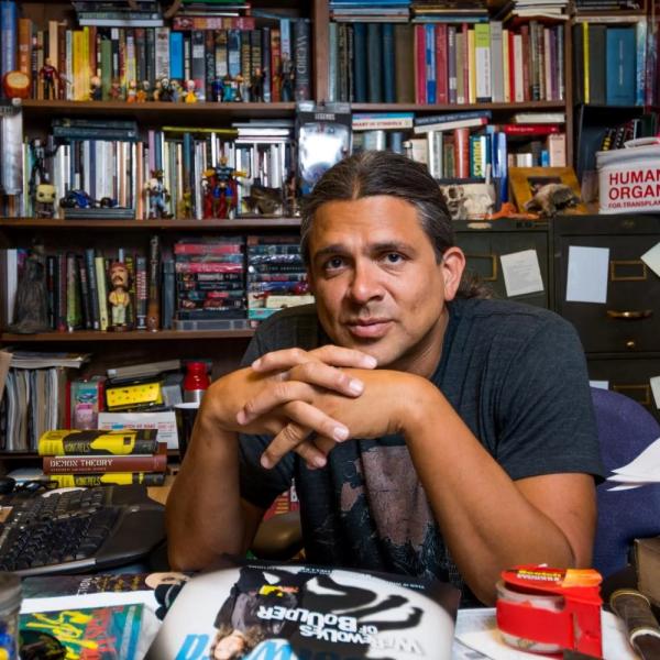 Stephen Graham Jones in his office