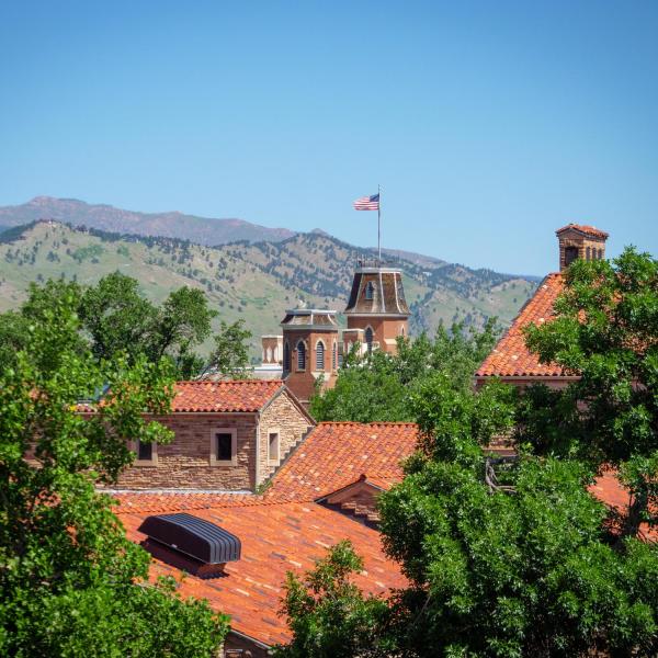 Old Main building with flag flying