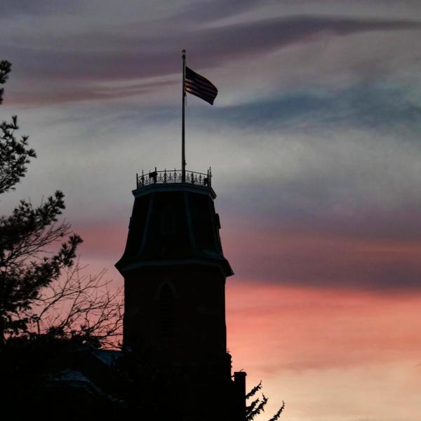 Silhouette of Old Main at sunset