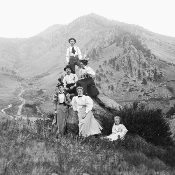 Group of people pose for a photo in the City of Boulder Reservoir, 1875