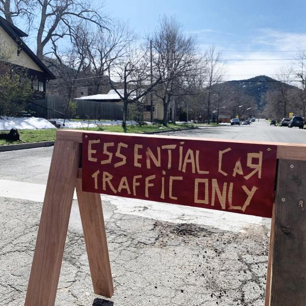 sign that reads 'essential car traffic only'