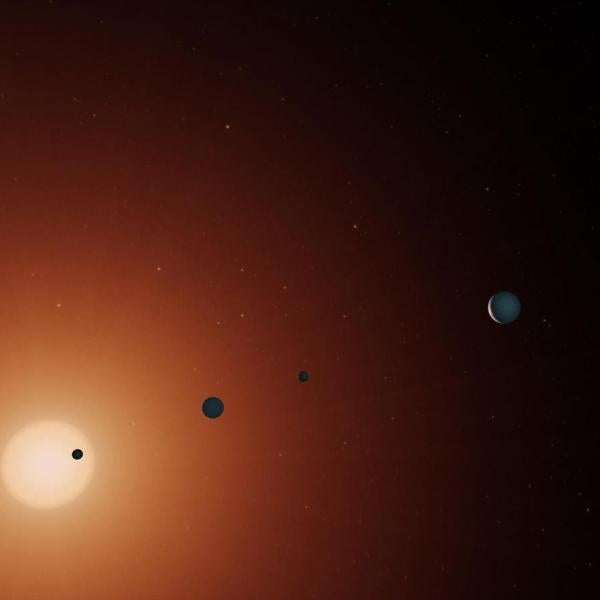 Illustration of five planets with a star in the background