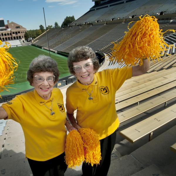 Twins Peggy Coppom, left, and Betty Hoover. (Photo by Glenn Asakawa/University of Colorado)