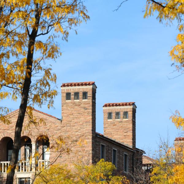 Fall leaves frame campus building. (Photo by Casey A. Cass/University of Colorado)