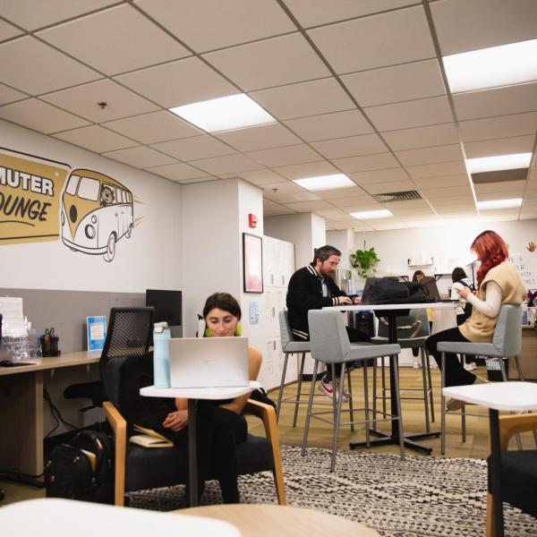 Students sitting in the UMC commuter lounge