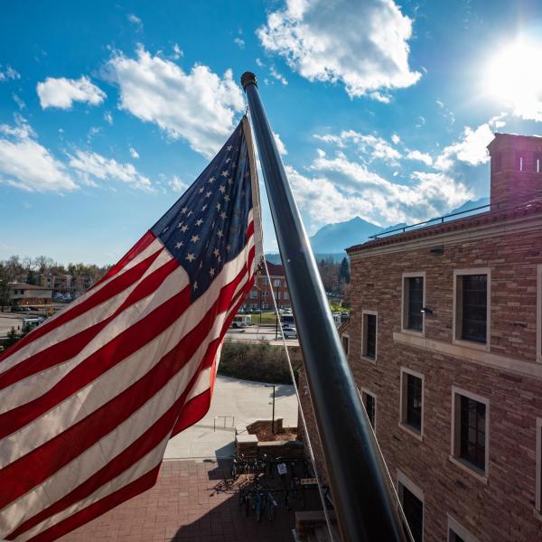 American flag flying at UMC