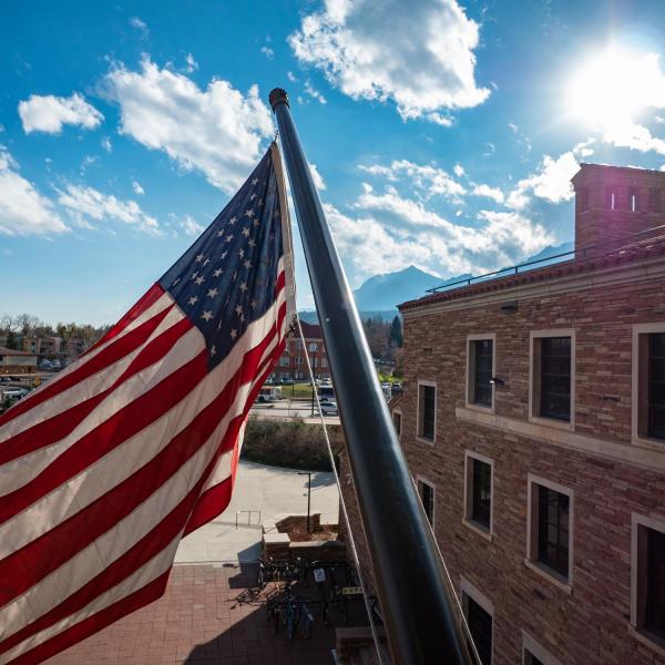 American flag flying in front of UMC