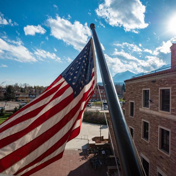 U.S. flag flies in front of the UMC