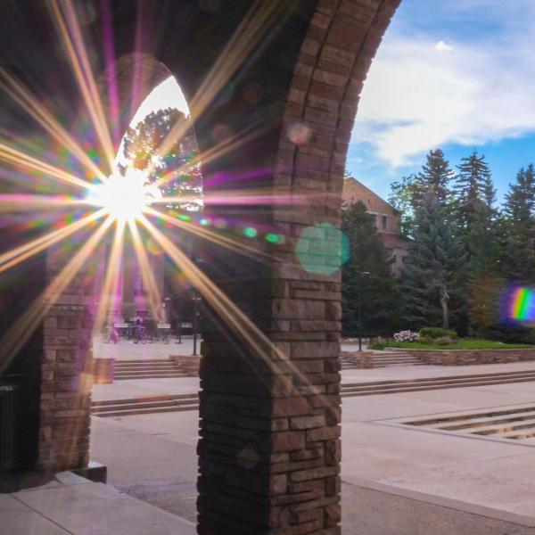 The sun sets behind the UMC loggia.