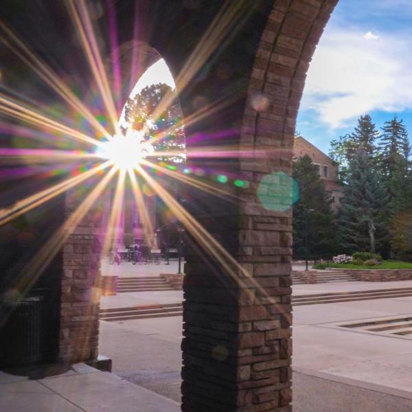 The sun sets behind the UMC loggia.