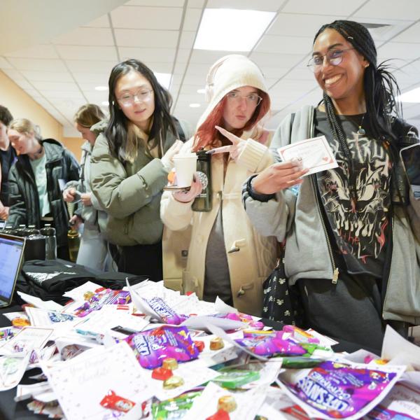 Students partake in the I Love Mondays candy and valentines giveaway