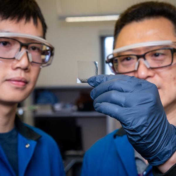 Chemistry chair Wei Zhang (Right) and Graduate Research Assistant Zepeng Lei study plastic materials in the Zhang Lab.