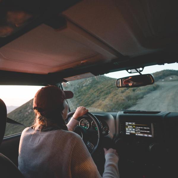 person driving in the mountains