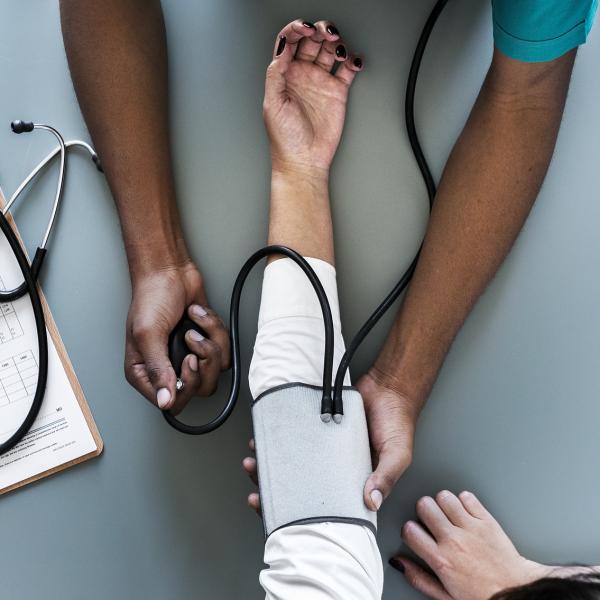 Blood pressure exam.