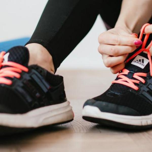 Woman with gym shoes on