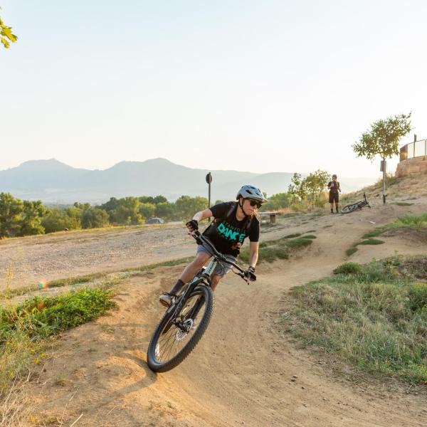 person riding a bike on a trail