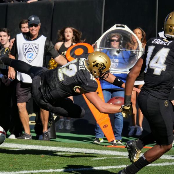 Colorado Buffaloes quarterback Steven Montez dives for a touchdown against Stanford on Saturday, Nov. 9, 2019. (Photo by Glenn Asakawa/University of Colorado)