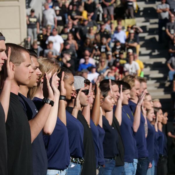 Fifty new recruits from the state of Colorado are sworn in to their respective military services during the first half of the Colorado-Stanford football game at Folsom Field on Saturday, Nov. 9, 2019. (Photo by Glenn Asakawa/University of Colorado)