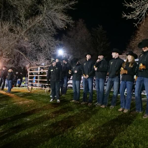 Ralphie V's handlers pose with her ahead of Colorado's game against Washington on Saturday, Nov. 23, 2019. (Photo by Glenn Asakawa/University of Colorado)