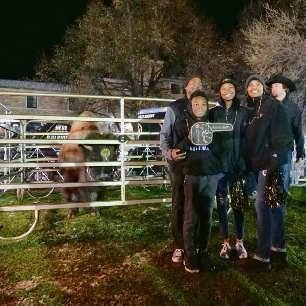 People take photos with the retiring Ralphie V ahead of Colorado's game against Washington on Saturday, Nov. 23, 2019. (Photo by Glenn Asakawa/University of Colorado)