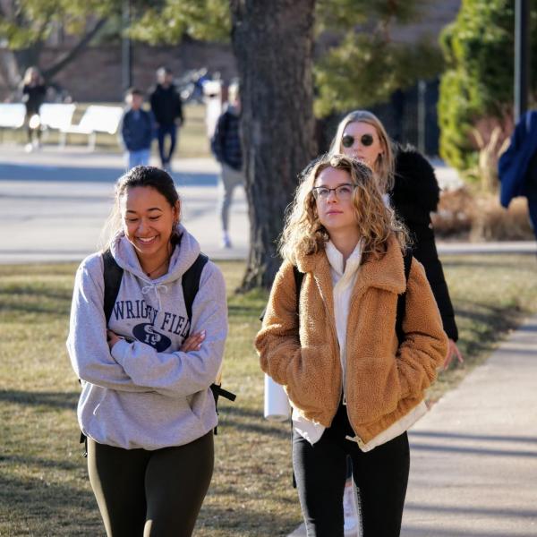 Students walk across campus on the first day of the spring 2020 semester at CU Boulder. (Photo by Glenn Asakawa/University of Colorado)